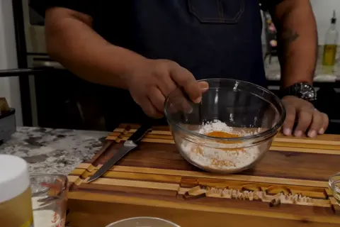 Prepare the seasoned flour